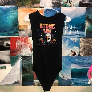 Stone row black onesie